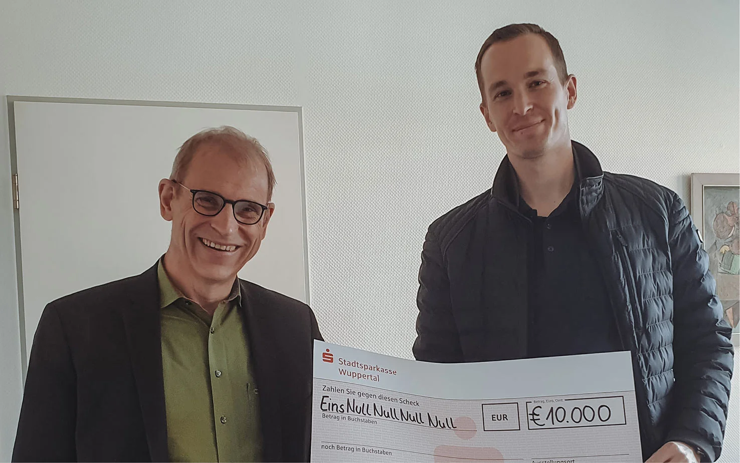 Spenden Ballen Ukraine Scheckübergabe Caritas
